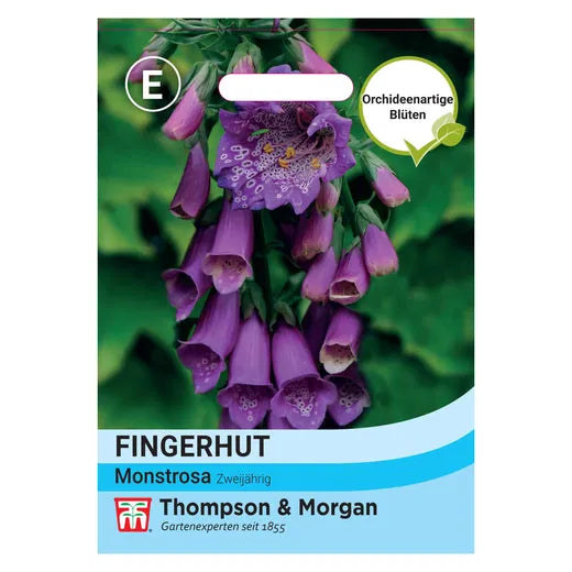 Das Thompson&Morgan - Fingerhut 'Monstrosa' Saatgutpaket zeigt violette, glockenförmige Blüten und grünes Laub, mit einem Text, der diese botanischen Wunder und ihre orchideenähnlichen Blüten betont.