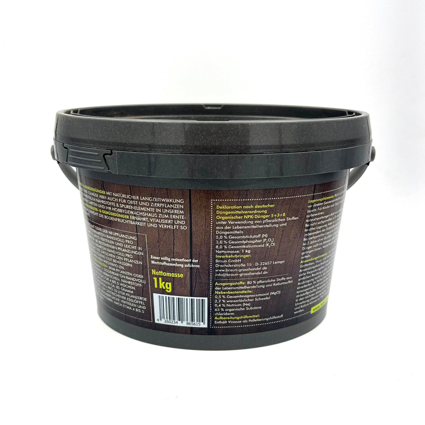 Ein schwarzer Plastikbecher mit Deckel trägt das La'Bio Kräuter- & Gemüsedünger-Etikett in deutscher Sprache mit gelben Akzenten. Dieser vegane, umweltfreundliche Dünger (1 kg) von La'Bio ist auf einem schlichten weißen Hintergrund abgebildet.