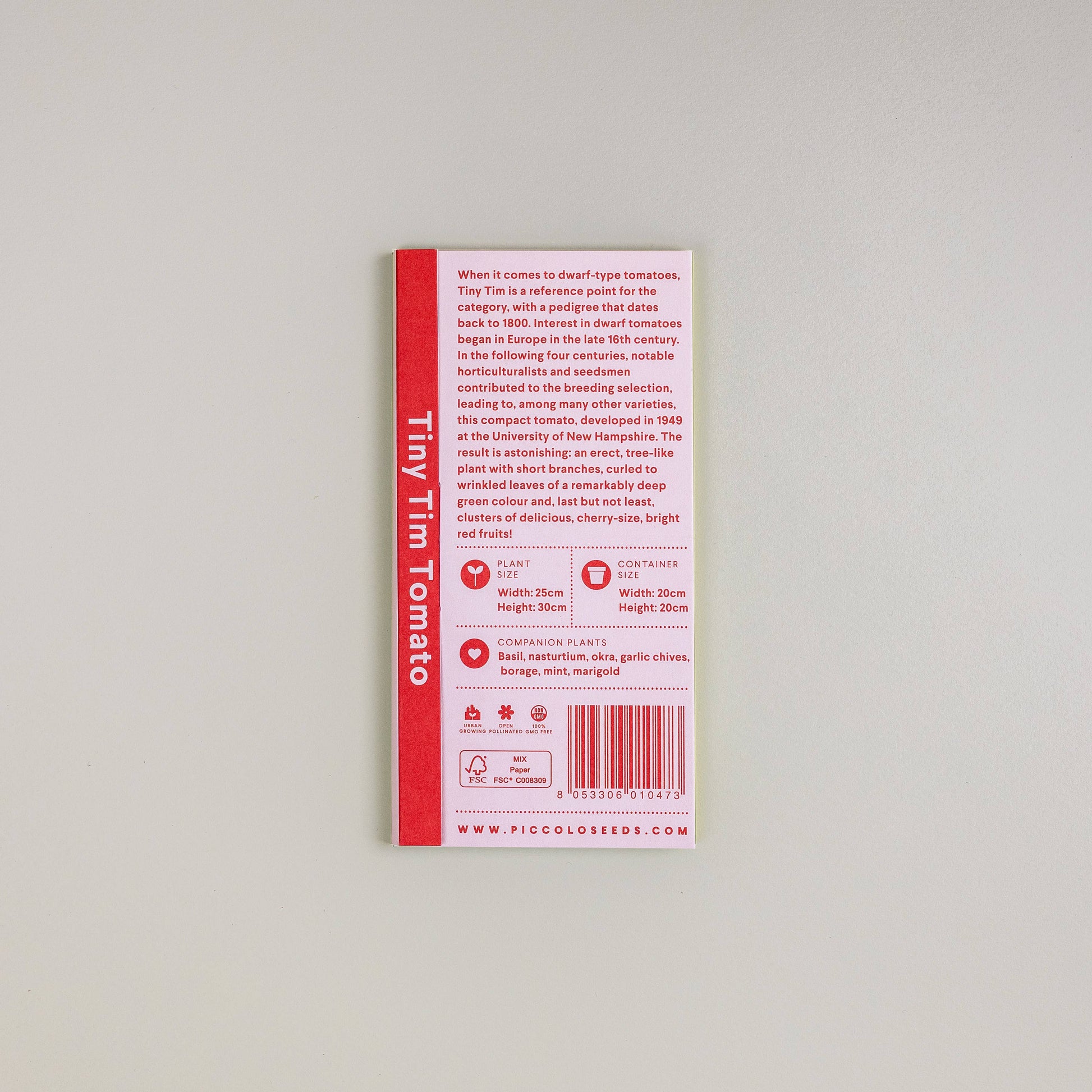 Eine rot-weiße Packung „Piccolo Seeds – Tomate Tiny Tim“ von Piccolo Seeds enthält Pflanzinformationen, eine kurze Beschreibung und eine Pflanzenabbildung auf der Rückseite sowie unten einen Strichcode und Kontaktdaten.