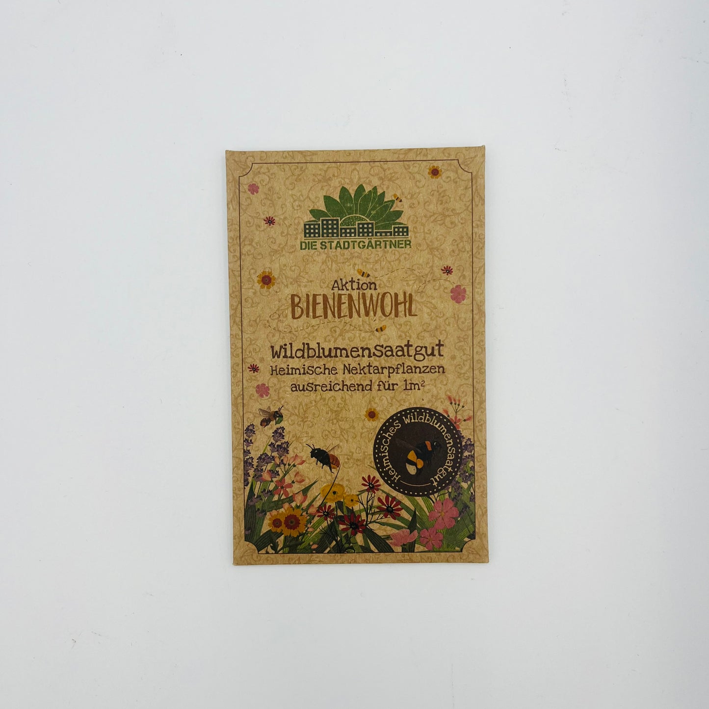 Ein Stadtgärtner Bienenwohl - Wildblumensaatgut-Paket zeigt Wildblumen, Bienen und Waben und wirbt für heimische Nektarpflanzen für Bienen mit genügend Samen, um 1 m² zu säen.