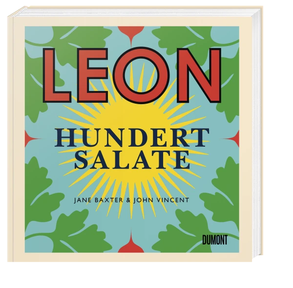 LEON. Hundert Salate von Jane Baxter & John Vincent hat einen blauen Einband mit kräftigem LEON-Rot, gelbem HUNDERT SALATE, Sunburst und grünen Blättern – ideal für Salatliebhaber auf der Suche nach neuen LEON-Rezepten. Erschienen im Dumont Verlag.
