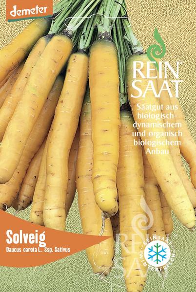 Ein Bund gelber Karotten mit grünem Blattwerk ist auf einer Samenpackung von Reinsaat - Karotte 'Solveig' abgebildet. Die Lagerkarotte-Samen sind biologisch, biodynamisch, Demeter-zertifiziert und haben eine Entwicklungsdauer von 100–120 Tagen.