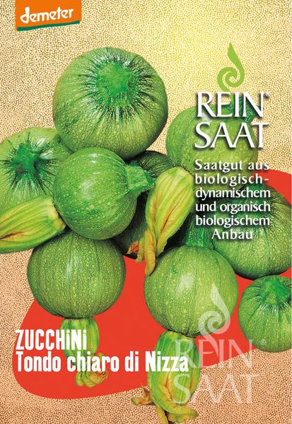 Die Reinsaat-Samenpackung für Zucchini „Tondo chiaro di Nizza“ (Cucurbita pepo) zeigt runde dekorative Früchte und Stiele, beschriftet mit „Saatgut aus biologischem und biodynamischem Anbau“.