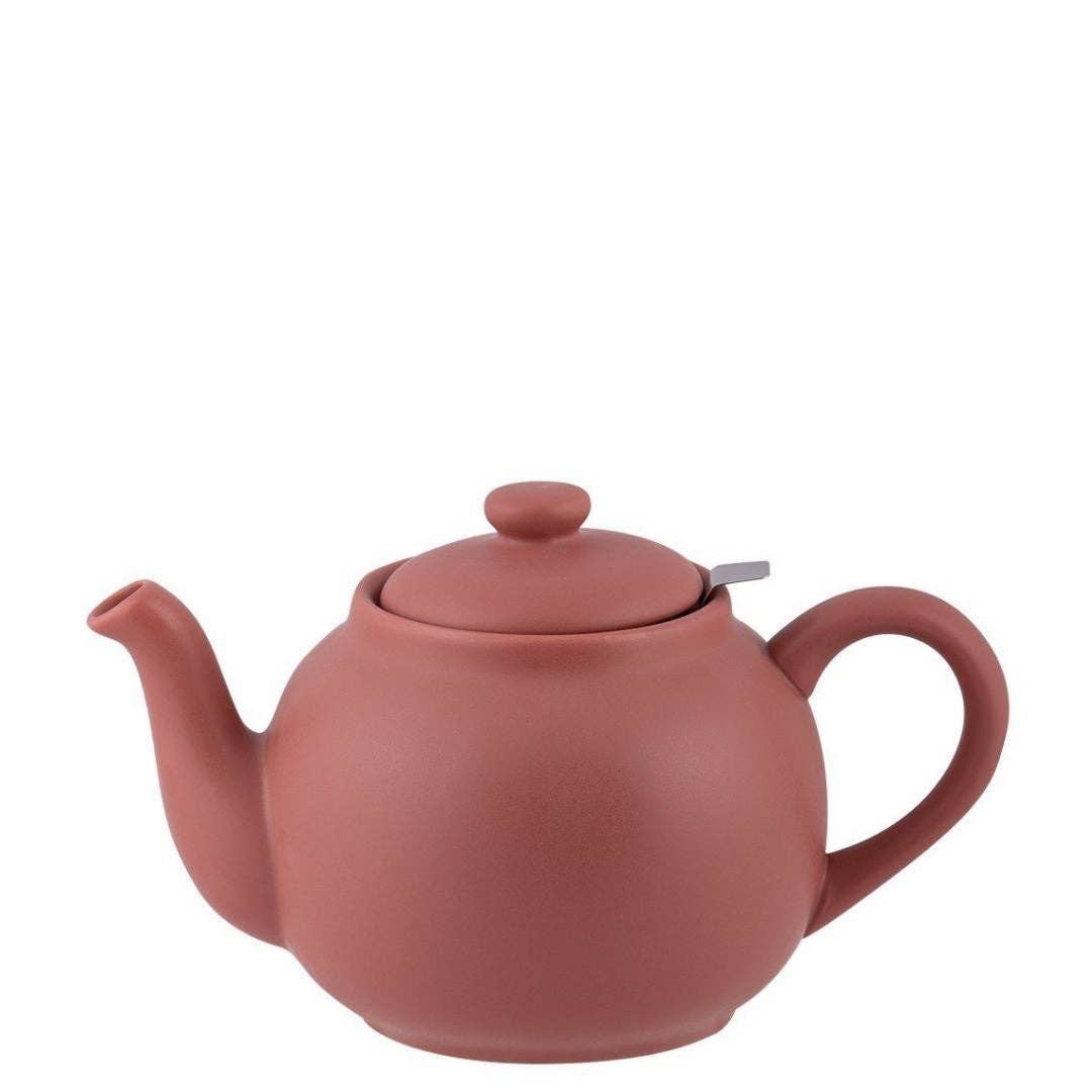 Die PLINT A/S - Teekanne 1,5 Liter von PLINT A/S ist eine runde, rosafarbene Steingut-Teekanne mit matter Oberfläche, geschwungenem Ausguss, abgerundetem Griff, aufgesetztem Deckel mit kleinem Knauf und einem Edelstahlfilter zum einfachen Aufbrühen.