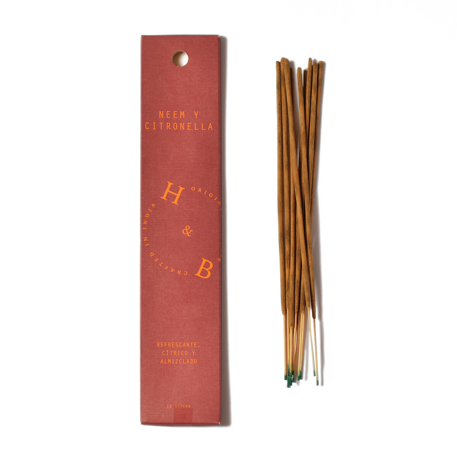Eine rosafarbene rechteckige Schachtel mit der Aufschrift "H&B Incense - Neem- und Citronella-Weihrauch (gegen Mücken)" von H&B Incense mit daneben angeordneten braunen Räucherstäbchen, die für ihre mückenabweisende Wirkung bekannt sind, auf weißem Hintergrund.