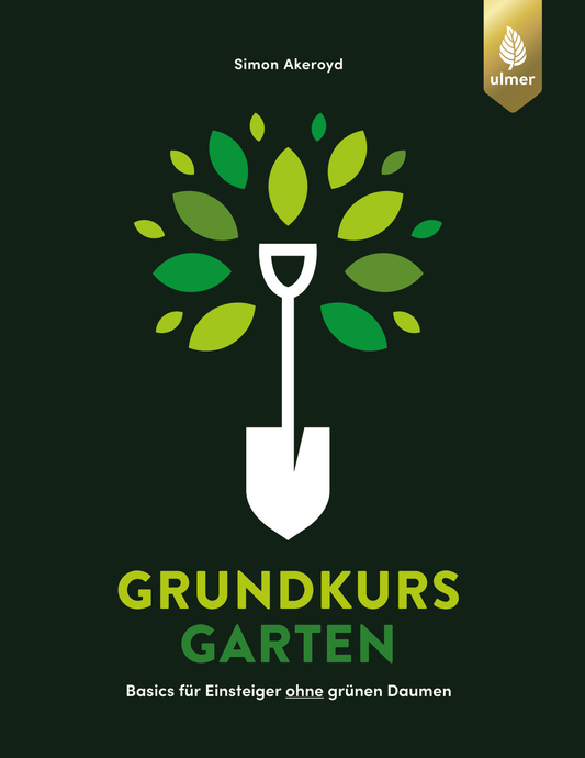 Das Buchcover des „Grundkurses Garten“ des Verlags Eugen Ulmer zeigt eine weiße Schaufel mit grünen Blättern auf dunklem Grund. Titel und Tipps zur Gartengestaltung sowie Grundlagen für Anfänger im Gartenbau werden angezeigt.