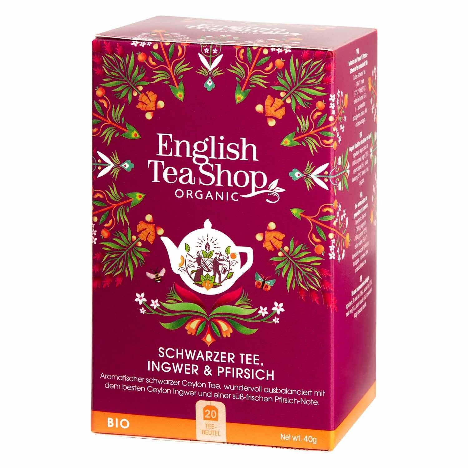 Eine Packung English Tea Shop Schwarzer Tee, Ingwer & Pfirsich, BIO, 20 Beutel. Die tiefrosa Box mit weißer Teekanne und bunten Blumenmotiven informiert auf Deutsch über die hochwertige Schwarzteemischung.