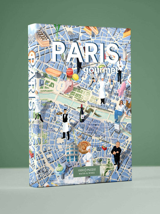 Das Water & Wines - Gourmet-Puzzle - Paris ist ein 1000-teiliges Puzzle mit einer Karte von Paris, charmanten Köchen, Leckereien der Pariser Küche und Weingläsern auf Grün - das ideale Geschenk für Feinschmecker und Puzzle-Liebhaber von Water & Wines.