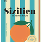 Das italienische Kochbuch „Sizilien in meiner Küche“ vom DK Verlag zeigt auf dem Cover eine große Orange mit grünem Blatt vor türkis-cremefarbenen Streifen; Ein gelber Aufkleber markiert die überarbeitete Edition.