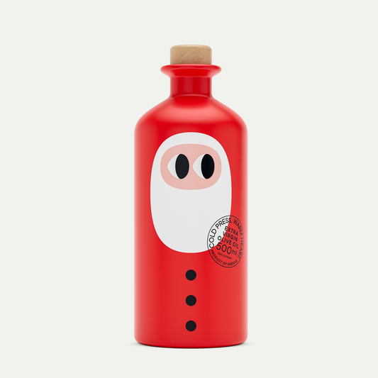 Die yiayia and friends Weihnachtsedition: Natives Olivenöl extra (500 ml) in einer roten Flasche mit schlichtem Santa-Motiv, Holzdeckel und Rundetikett. Die limitierte Auflage ist das perfekte Geschenk für Feinschmecker!.