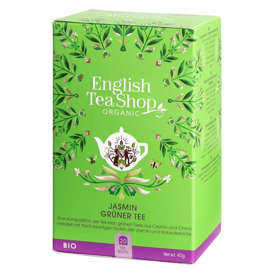 Eine grüne Schachtel Jasmin Grüner Tee BIO von English Tea Shop mit floralen Motiven, einer weißen Teekanne und deutscher Produktinformation enthält 20 Bio-Teebeutel.