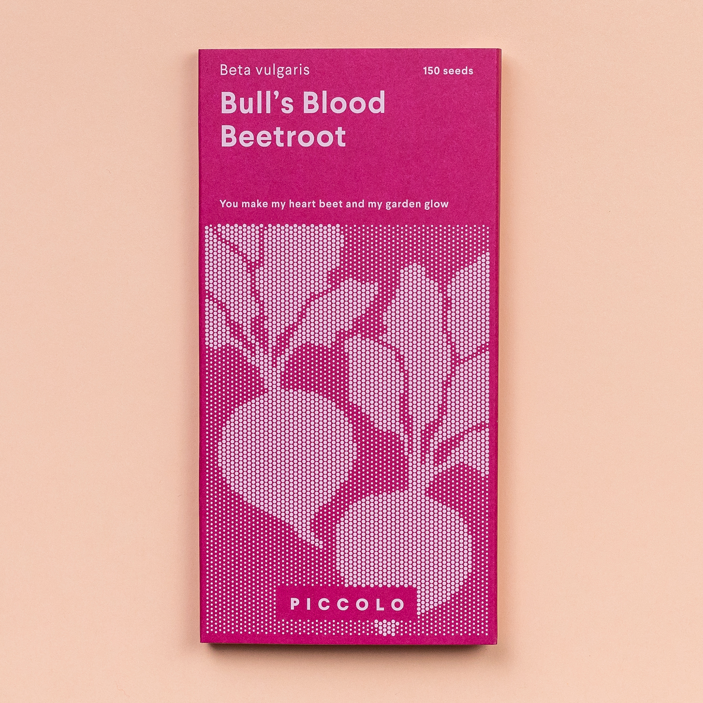 Eine rosa Piccolo Seeds-Packung mit der Aufschrift Rote-Bete-Bullenblut, eine alte Rübensorte mit 150 Samen, bezaubernden Rote-Bete-Illustrationen und der Botschaft: Du bringst mein Herz zum Rübenbluten und meinen Garten zum Glühen. Marke: Piccolo Seeds.