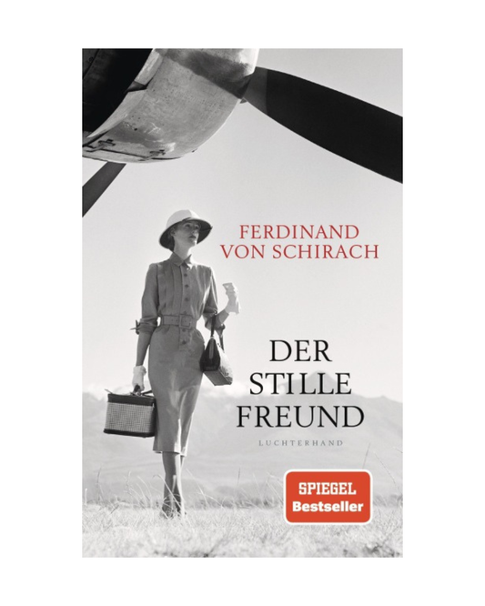 Schwarz-weißes Cover von Der stille Freund | Buch von Ferdinand von Schirach (Luchterhand Verlag): Eine altmodisch gekleidete Frau mit Koffer und Hut steht neben einem Flugzeug und deutet neue Erzählungen an. SPIEGEL Bestseller-Aufkleber unten rechts.