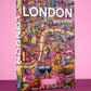 Das Water & Wines - Gourmet-Puzzle - London ist ein lebhaftes 1000-teiliges Puzzle von Water & Wines, das illustrierte kulinarische Wahrzeichen, Lebensmittel und Ikonen von London auf einem rosa Hintergrund zeigt - ein unverzichtbares kartenähnliches Puzzle für Essensliebhaber.