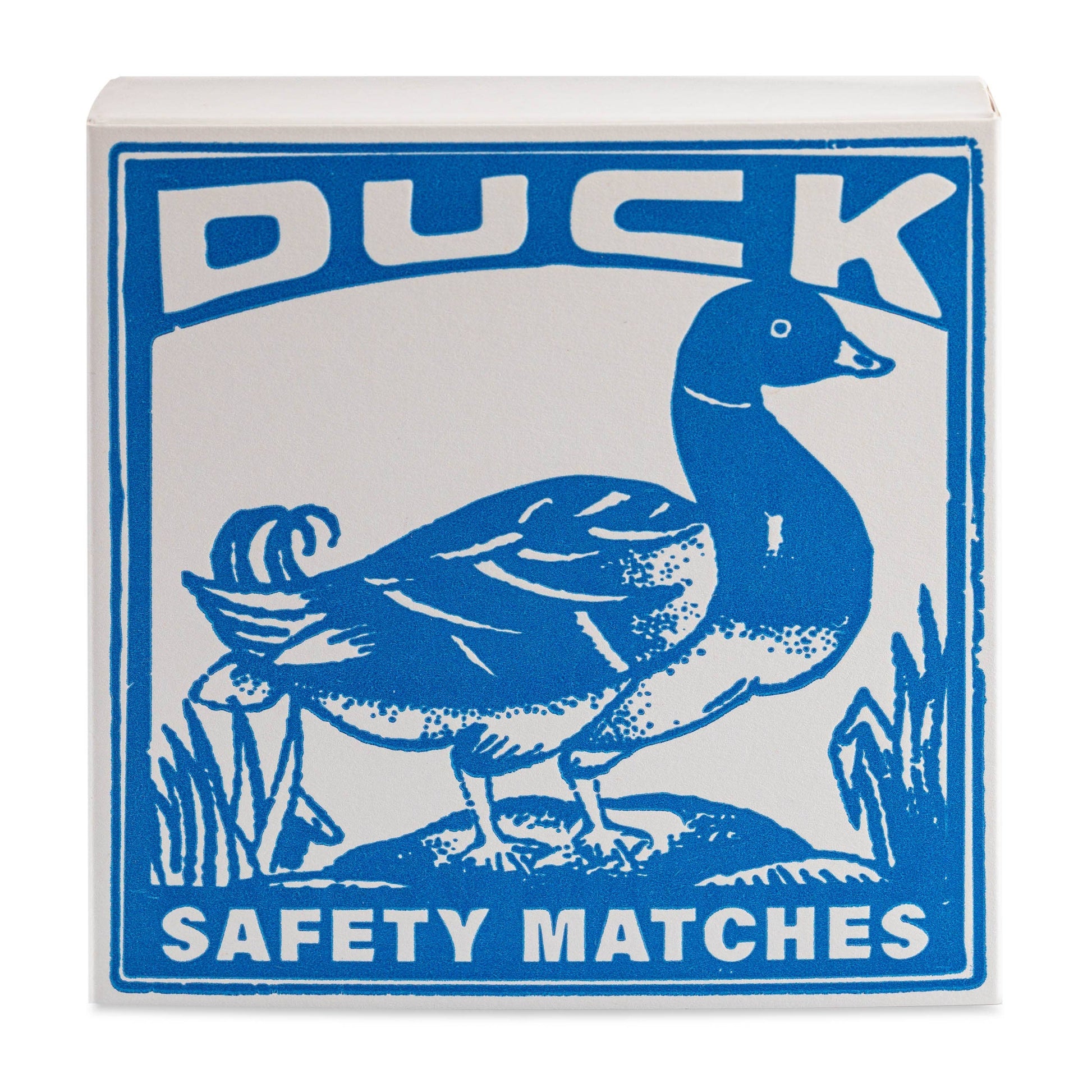 Die Archivist Gallery - Duck | Square - Sicherheitsstreichhölzer besteht aus einer blau-weißen Schachtel mit einem charmanten Entenmotiv, das oben mit "DUCK" und unten mit "SAFETY MATCHES" beschriftet ist.