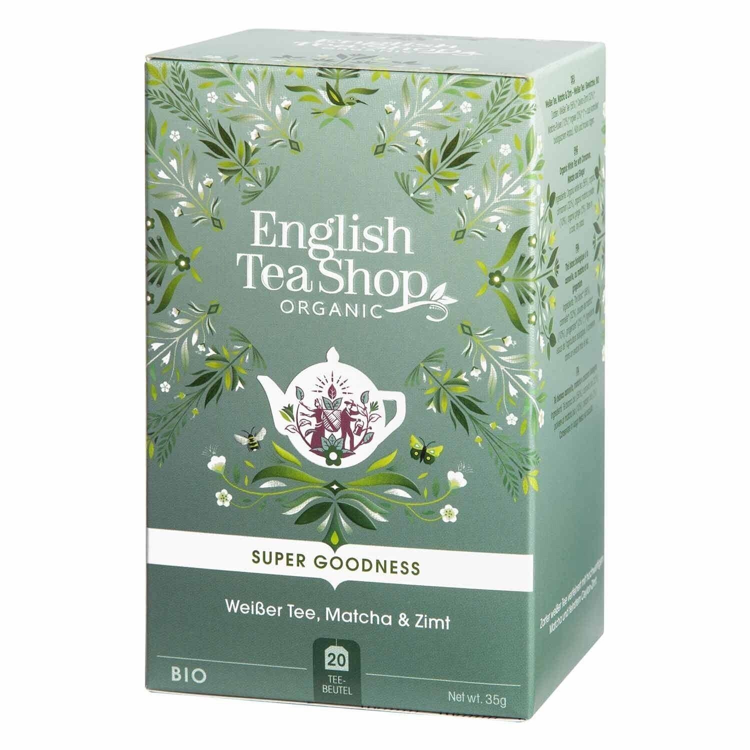Eine grüne Box von English Tea Shop Weißer Tee, Matcha & Zimt, BIO (20 Teebeutel), dekoriert mit botanischen Illustrationen und Teekannendesign. Frische und ausgewogene Mischung. Verpackungssprache: Deutsch. 35g Gesamtinhalt.