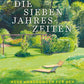 Das Buchcover von Die Sieben Jahreszeiten von Dr. Isabelle Van Groeningen zeigt einen sonnenbeschienenen Garten mit grünem Gras, einem hölzernen Liegestuhl, Bäumen und Büschen. Untertext: "Neue Anregungen für den Garten rund ums Jahr.